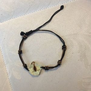 Bracelet with scorpion in it